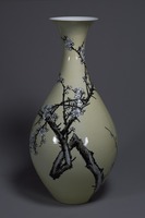 Yellow glazed bottle with plum tree picture in the rusty-painting  style image